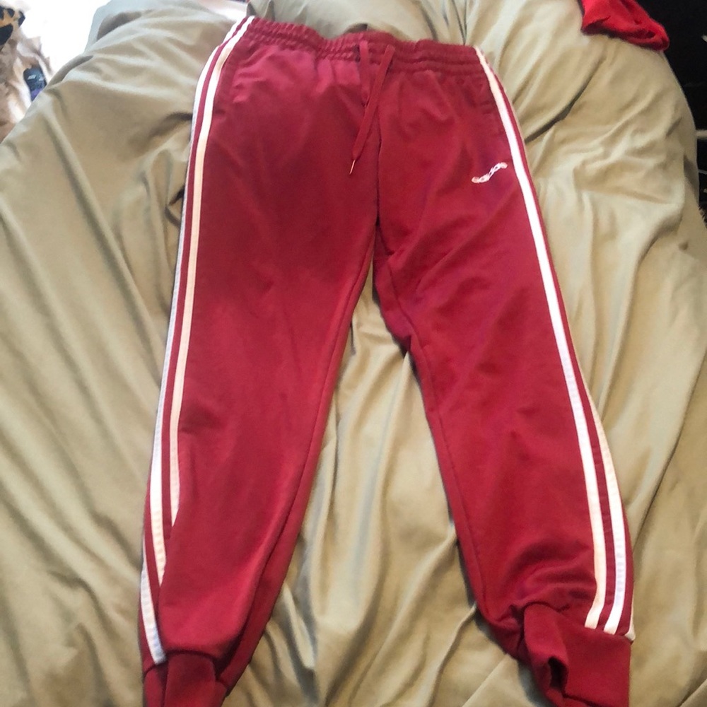 Red adidas track pants